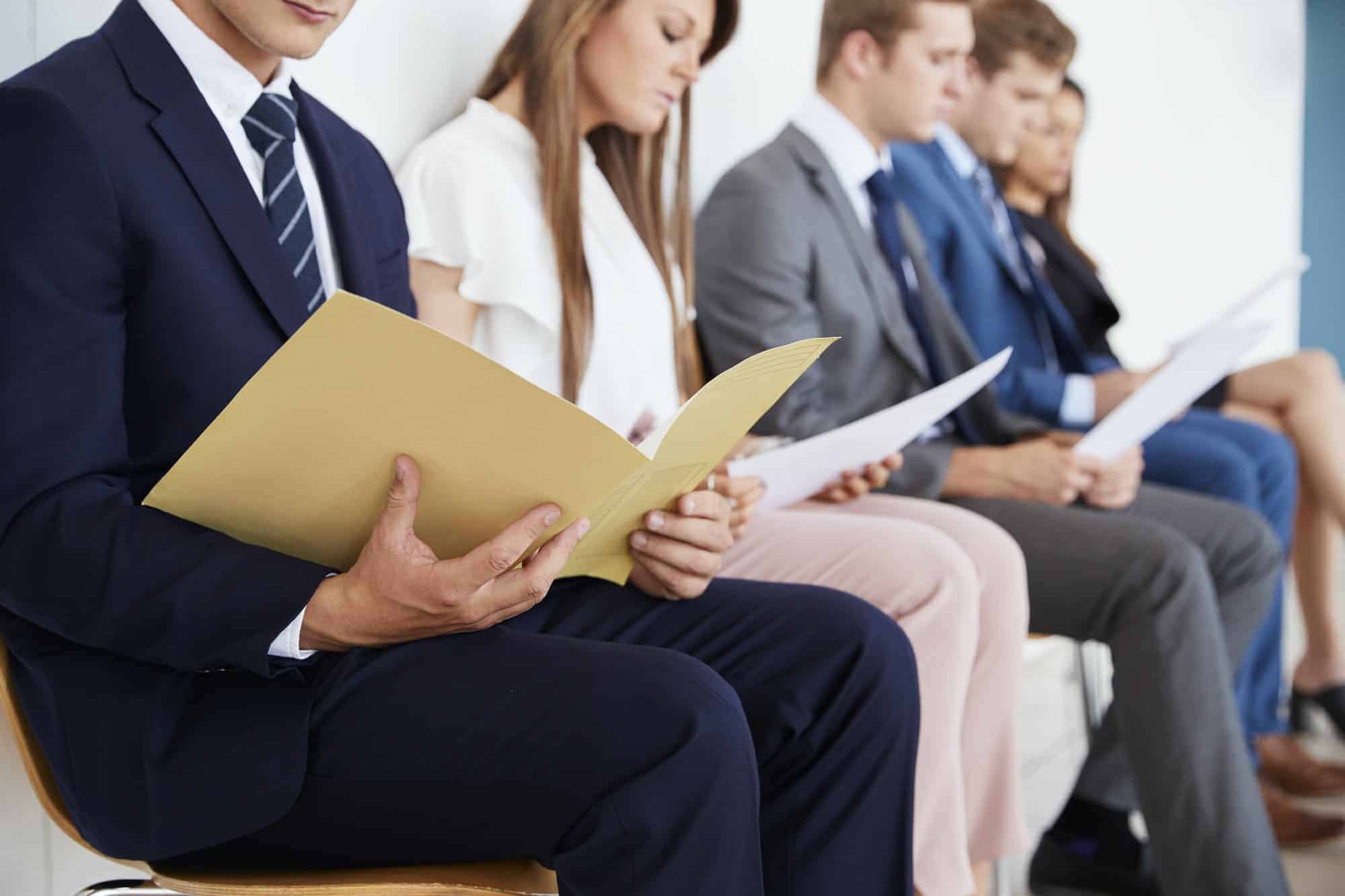 candidates waiting for job interviews mid section